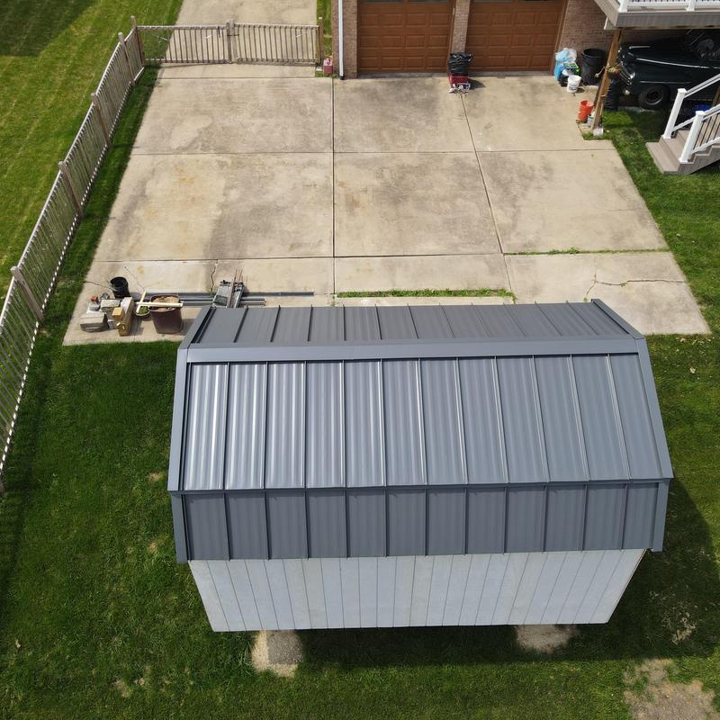 Steel Country standing seam metal roof on shed