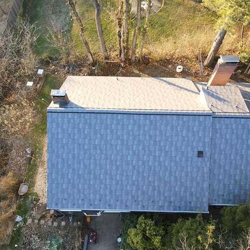 Asphalt shingle roof installation on residential home