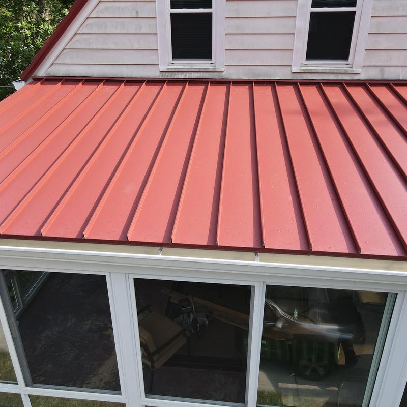 Steel Country metal roof with red finish