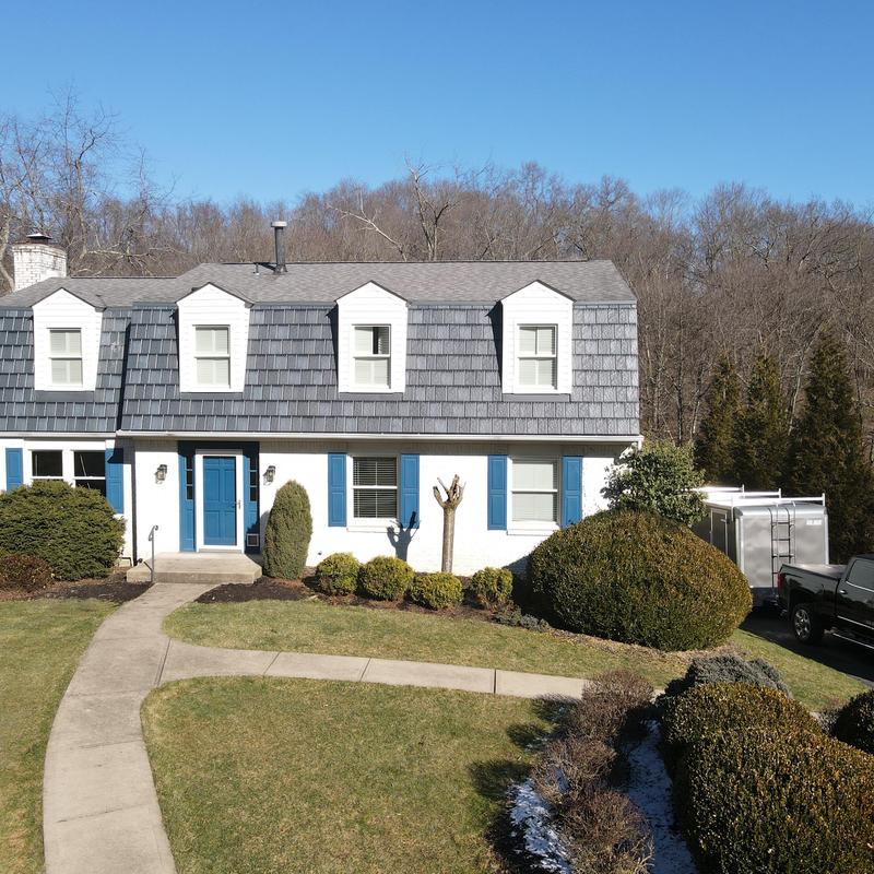 Steel Country metal roof on gambrel home sections