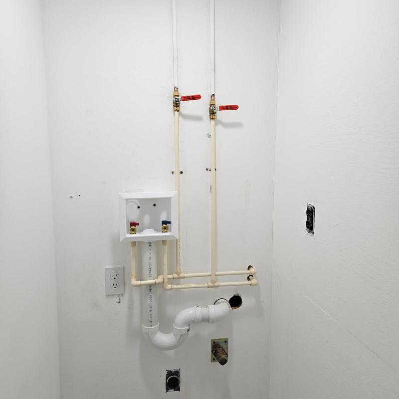 Washing machine outlet box with valves installed