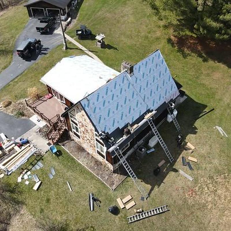 Steel Country metal roof with underlayment installation