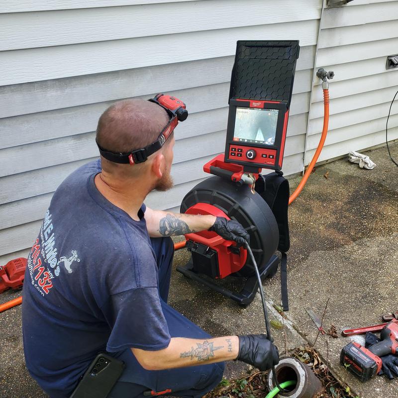 Main sewer drain camera inspection with monitor display