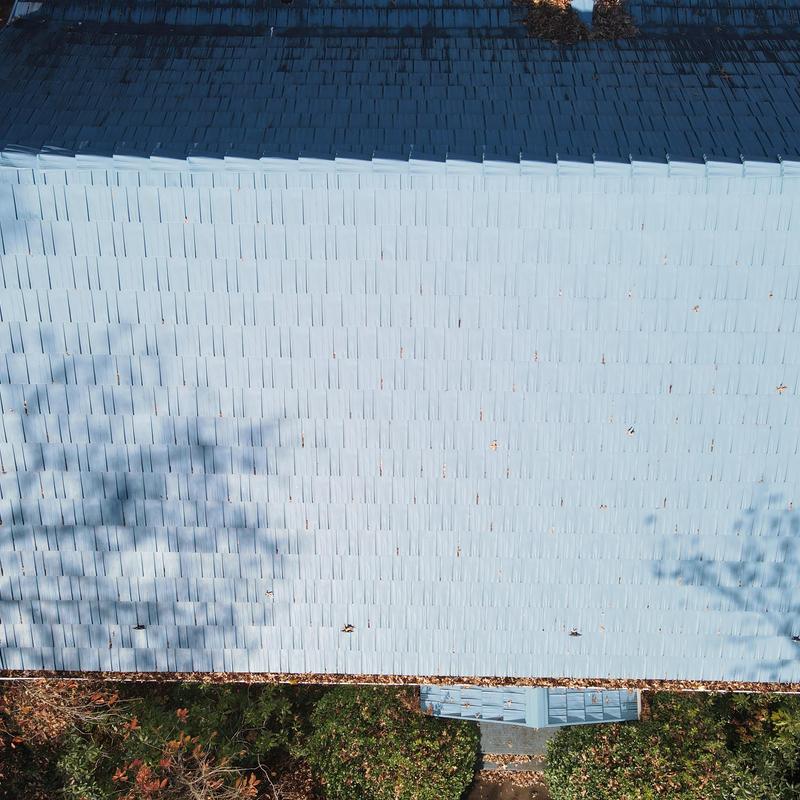 Steel Country Metal Shingle Roof with gutters and soffitfascia