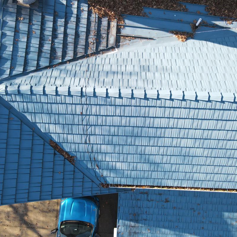 Steel Country Metal Shingle Roof with gutters and fascia