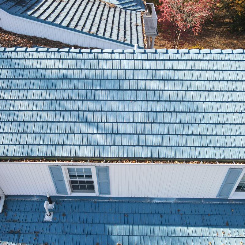 Steel Country Metal Shingle Roof with Gutters and Soffit
