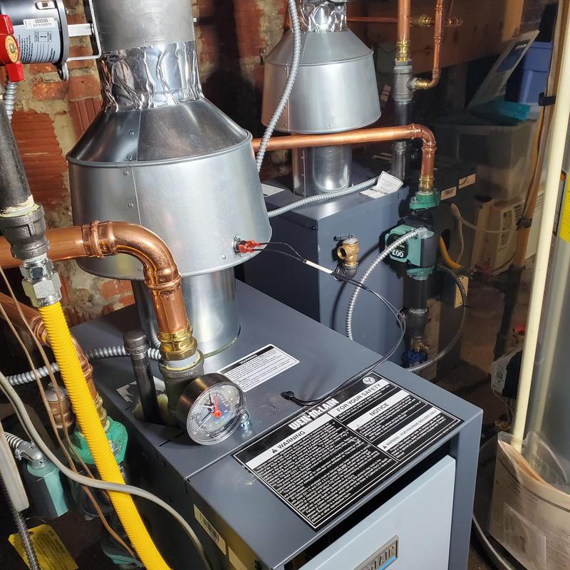 Weil-McLain gas boiler installation with copper piping