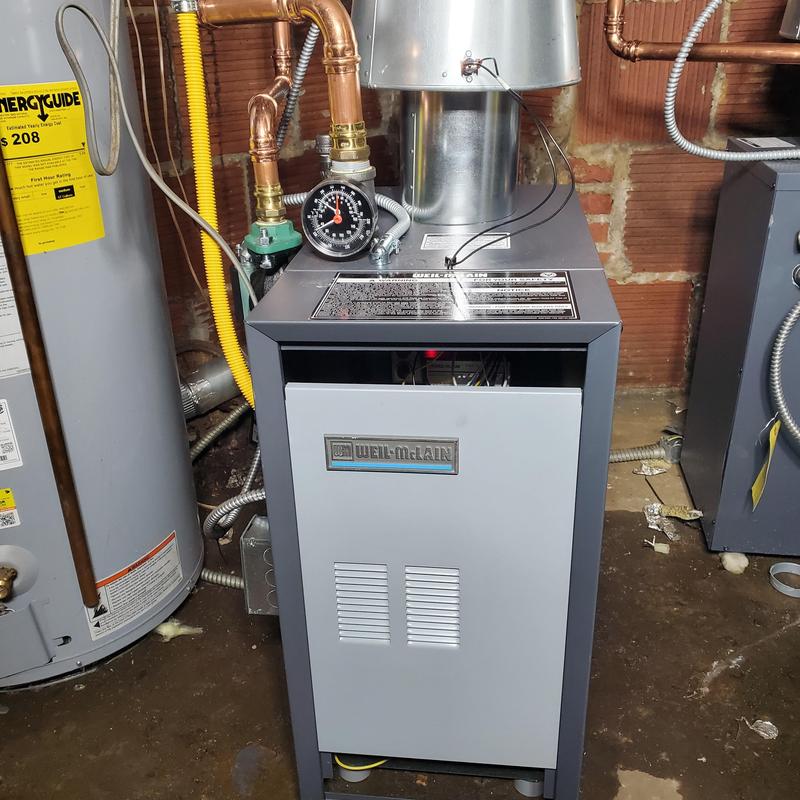 Weil-McLain gas boiler with pressure gauge installed