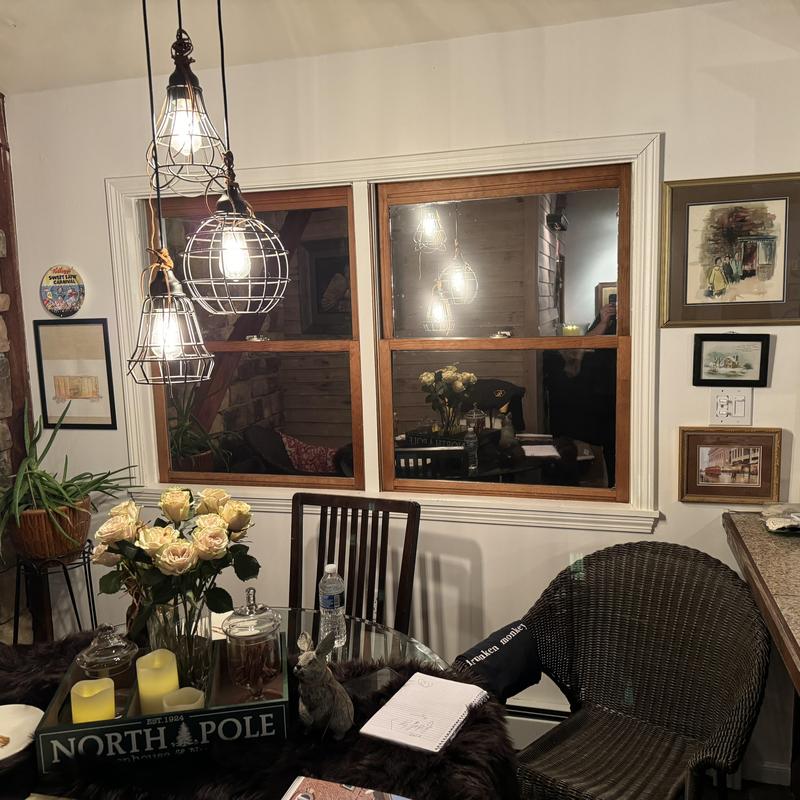 Window frame with wooden trim and indoor decor