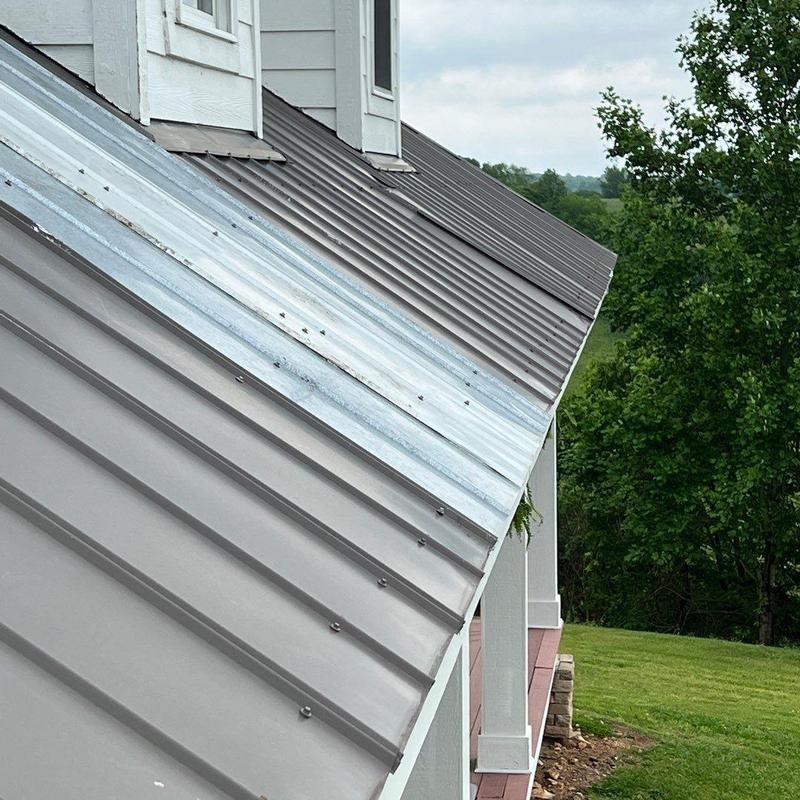 Metal roof panels with fasteners inspected outdoors