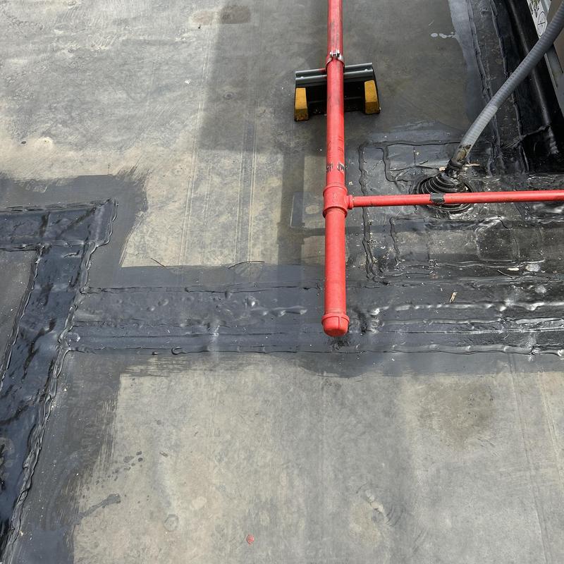 EPDM flashing and lap sealant on flat roof system