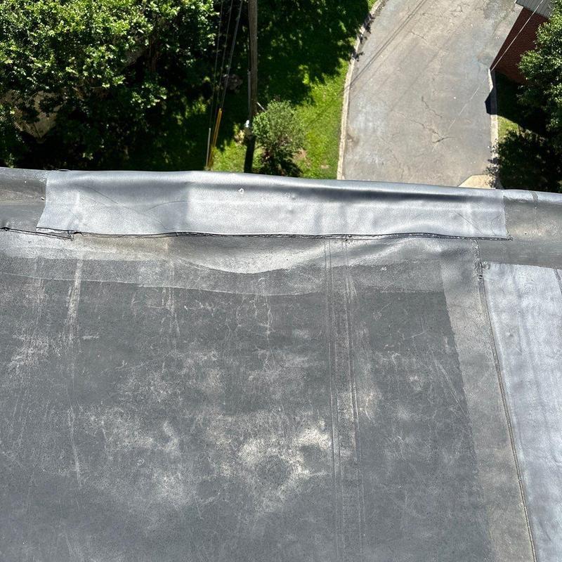 EPDM rubber roof membrane with patch repair detail