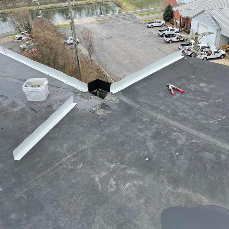 Flat commercial roof flashing and drip edge installation