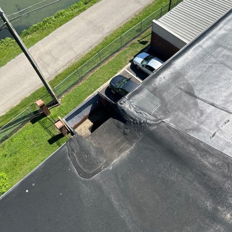 Flat roof membrane storm damage and patch work overview