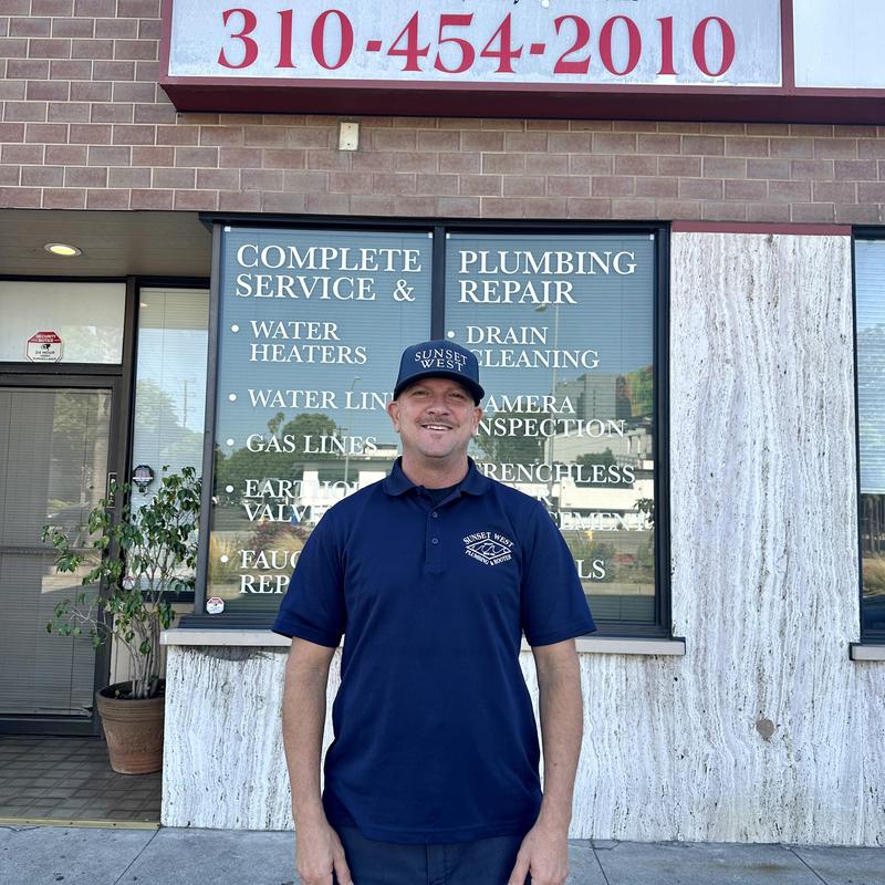 Tankless water heater descale service technician