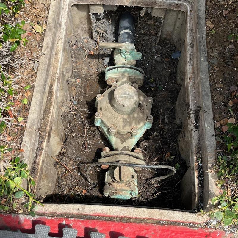 Water meter and shutoff valve in ground box