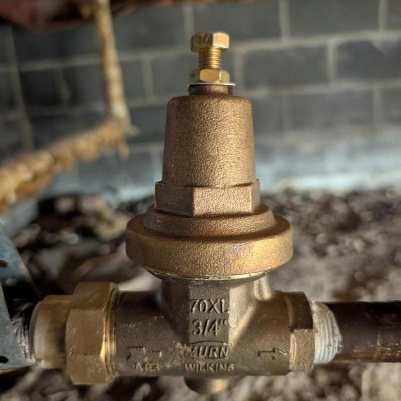 Pressure regulator valve with brass fittings installed