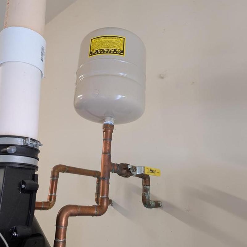 Thermal expansion tank with copper pipes on water heater