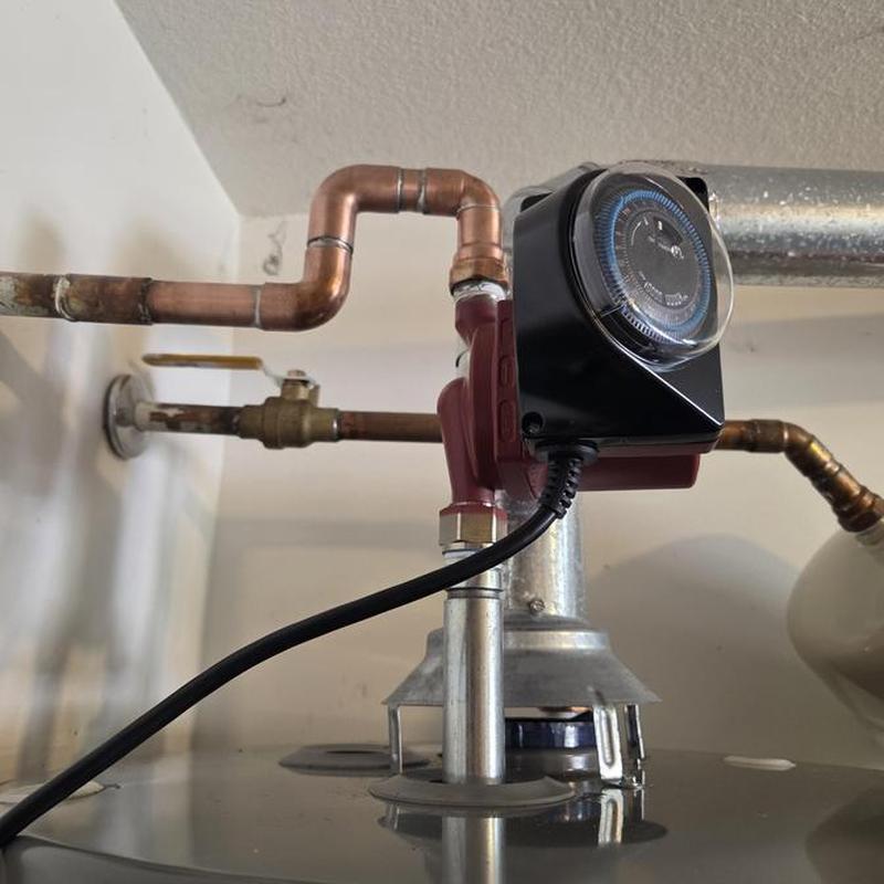Recirculation pump installed on gas water heater Recirculation pump installed on gas water heater