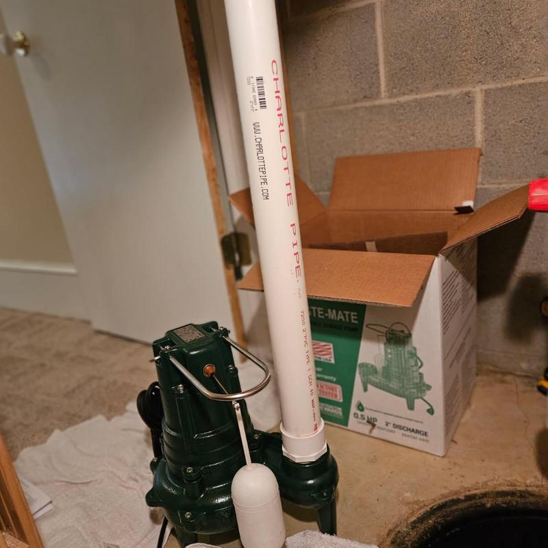 Zoeller sewage ejector pump with PVC discharge pipe