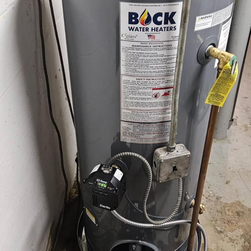 Oil-fired water heater with control valve installation
