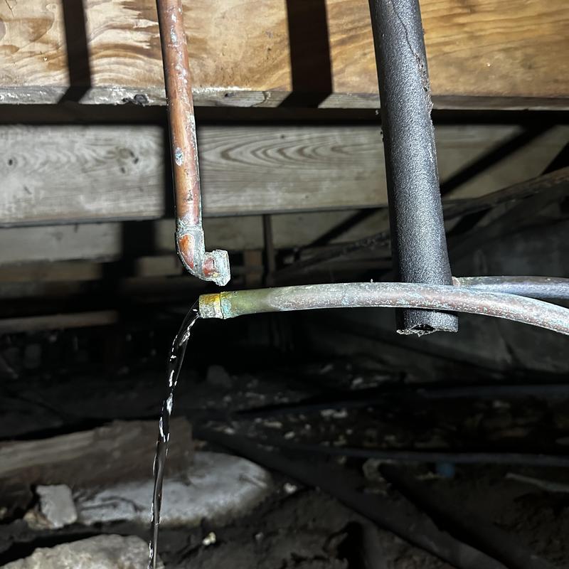 Copper pipe 90-degree joint leaking water in crawl space