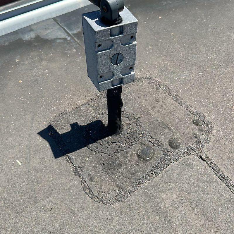 Roof-mounted electrical conduit seal with patching