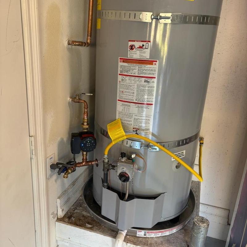 Water heater with high-efficiency recirculation pump installed