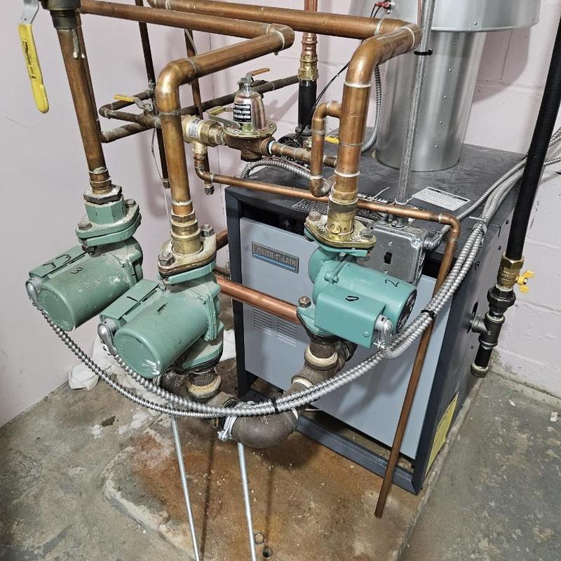 Weil-McLain gas boiler with copper piping installation