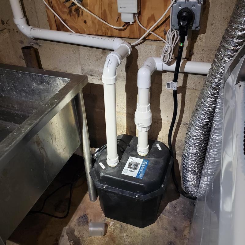 Pro Flow laundry pump with PVC piping installation