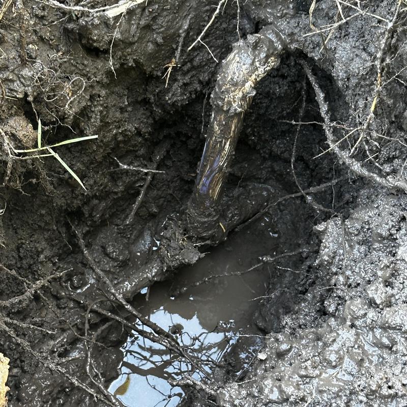 Underground water line with leak and mud in Plano