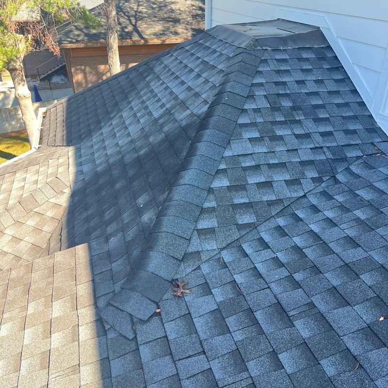 Asphalt shingle roof and ridge vent inspection