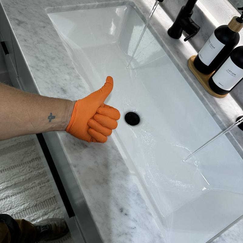 Kitchen sink drainage with clear flowing water