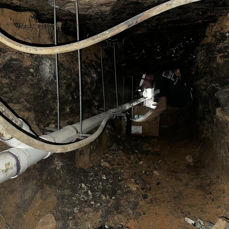 Schedule 40 PVC sewer pipe with riser clamps installation