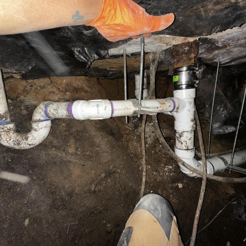 Schedule 40 PVC sewer piping with riser clamps