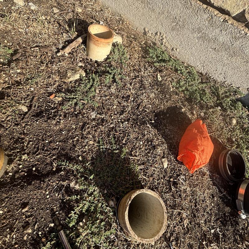 Sewer cleanout pipes and inspection equipment outdoors