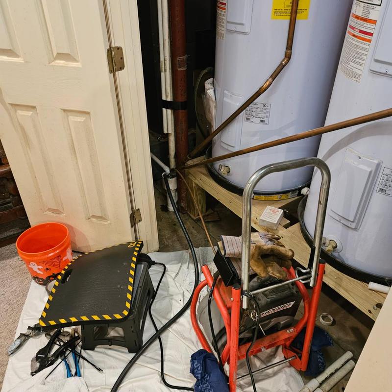 Condensation drain line snaking with plumber's tools