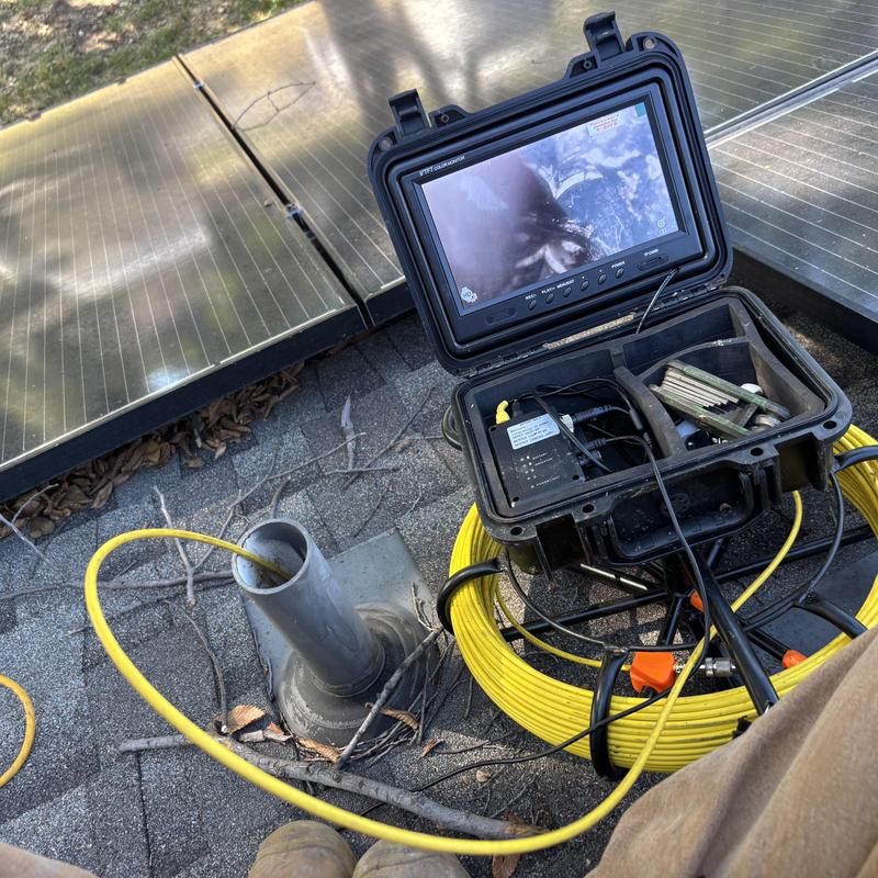 Sewer pipe camera inspection with root intrusions detected