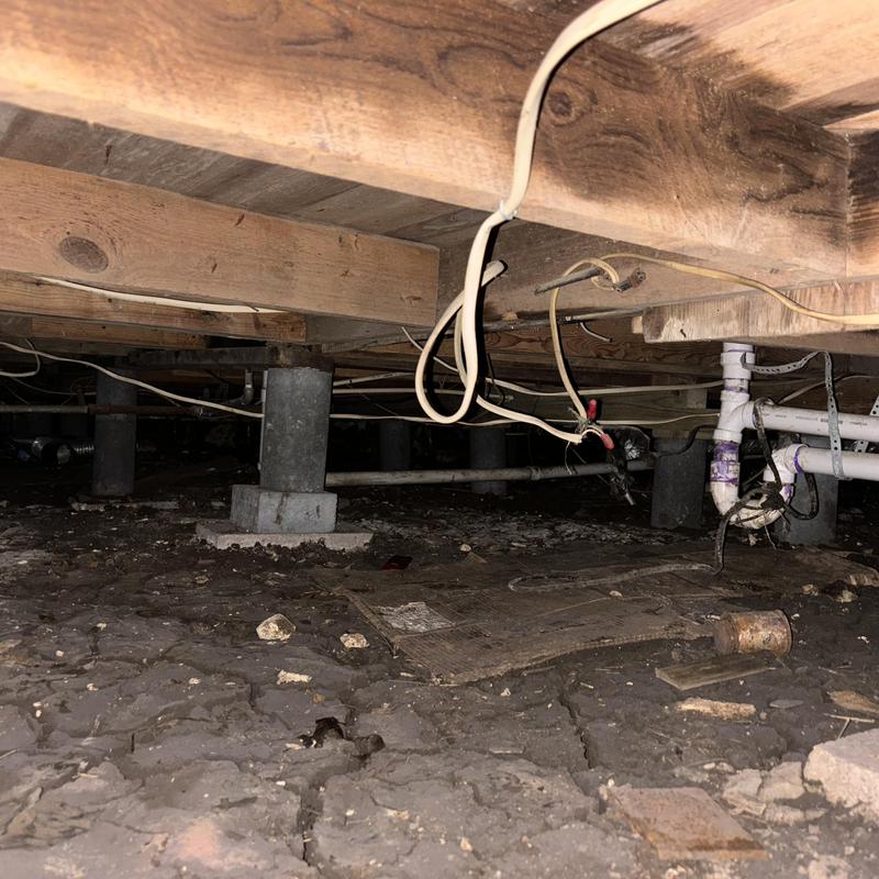 PVC kitchen sink drain line under crawl space