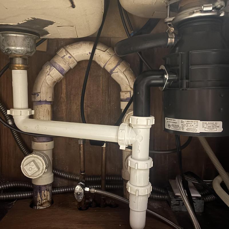 Kitchen sink drainage and garbage disposal piping installation