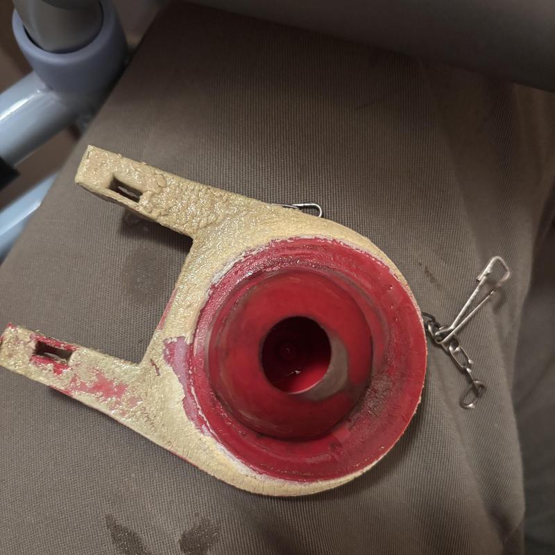 Toilet flapper valve with wear and buildup on fabric surface