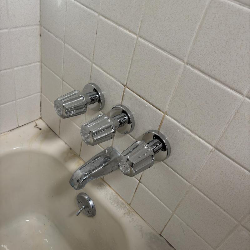 Shower stems and cartridges installation on tile wall