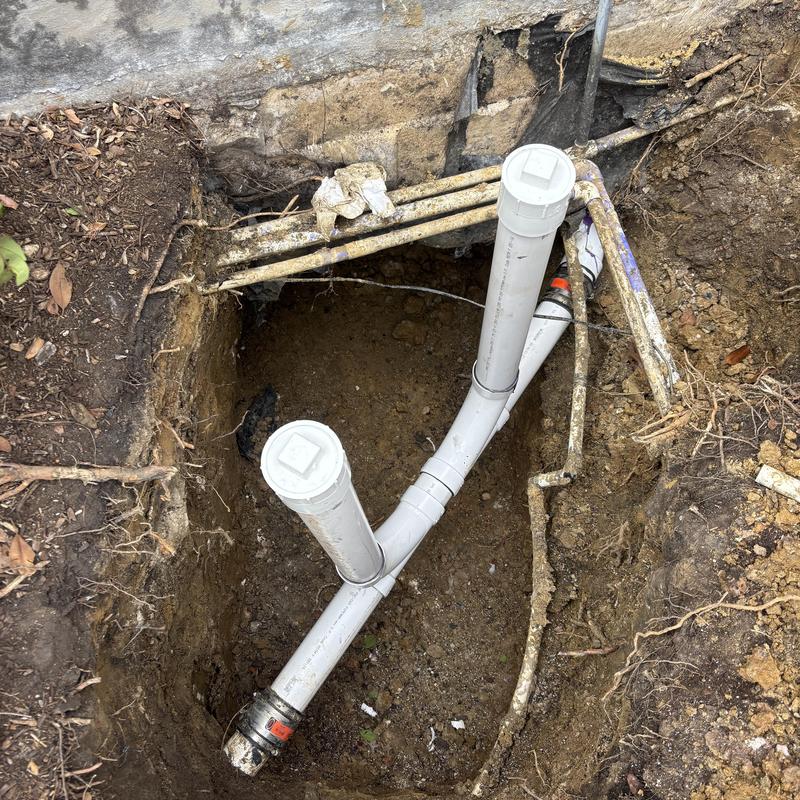 PVC double clean outs with new schedule 40 pipes in soil