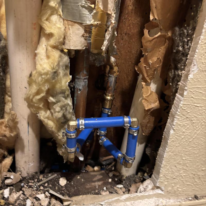 Copper water line with PEX-B piping replacement in wall