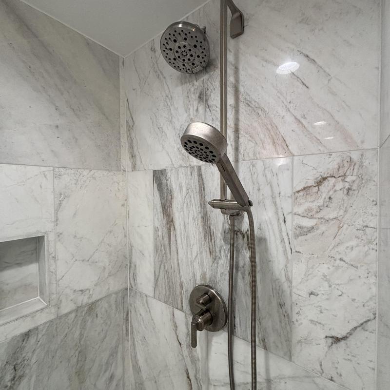 Shower cartridge valve and handheld showerhead installed