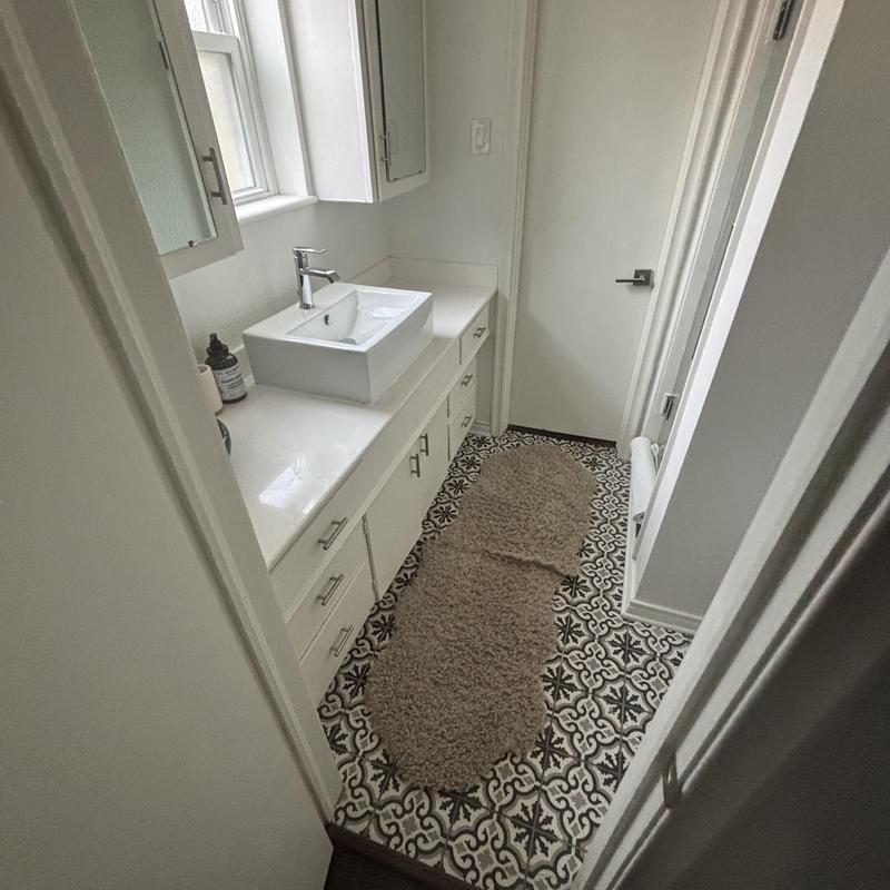 Bathroom sink drainage replaced under countertop