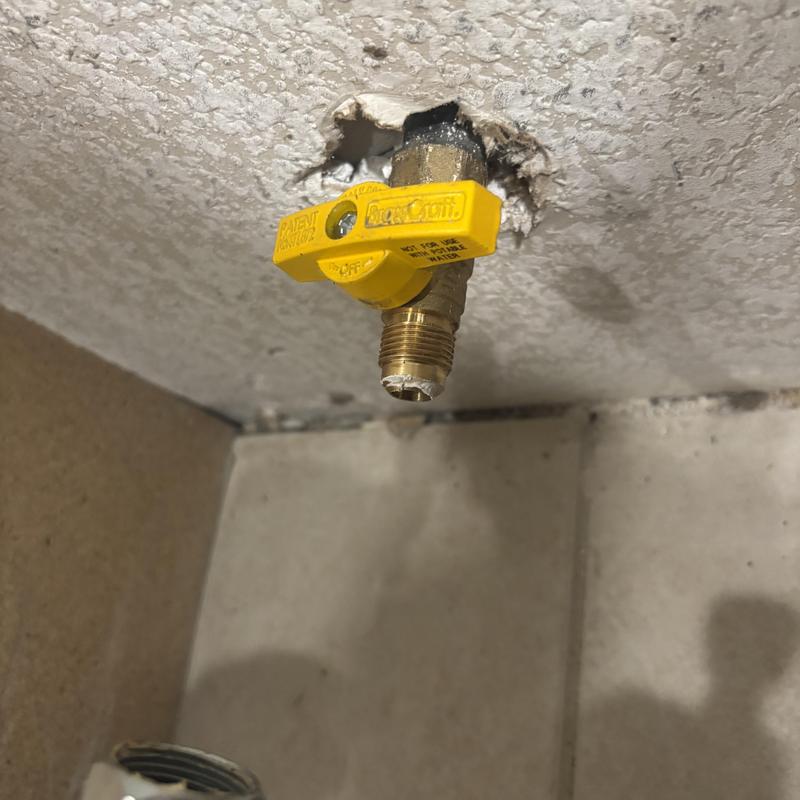 Gas shut off valve for stove installation in wall