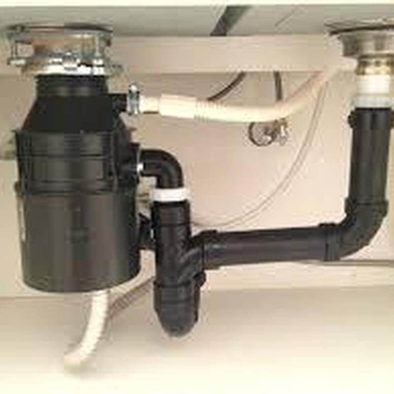 Garbage disposal and kitchen sink drain pipes installation