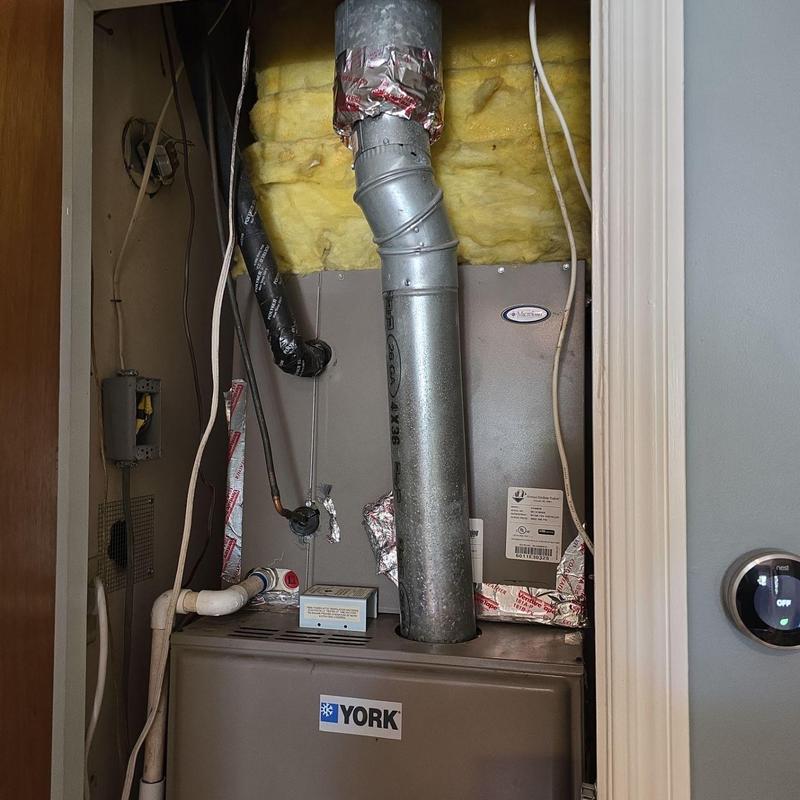 York furnace with vent pipe and insulation