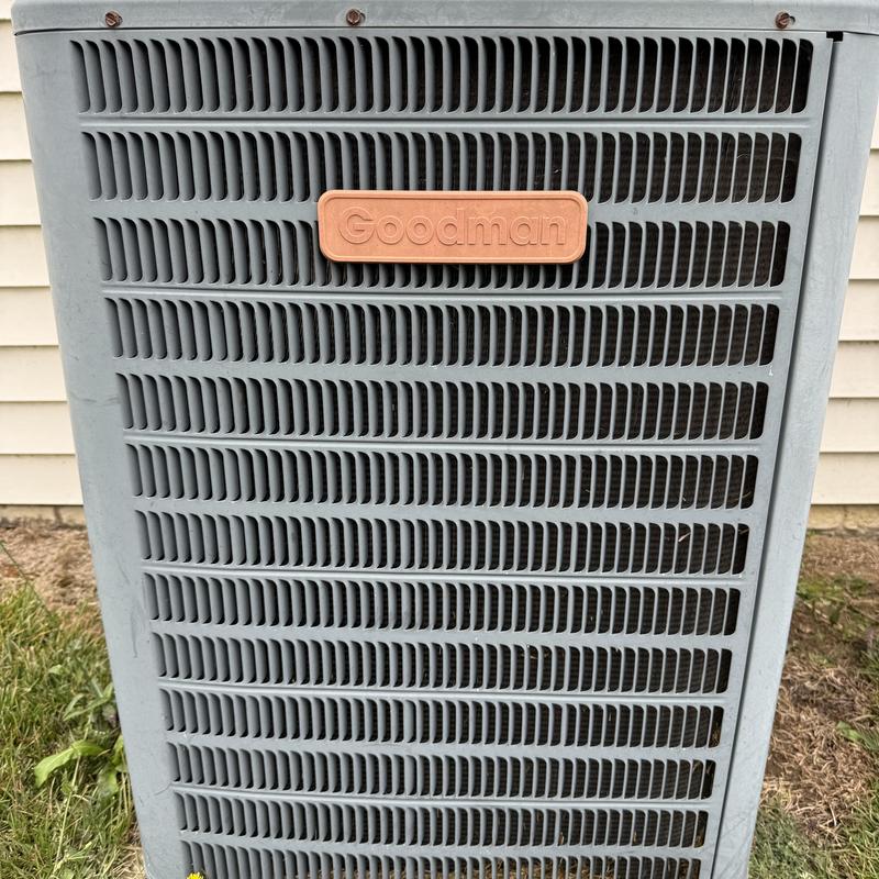 Goodman HVAC outdoor condenser unit close-up